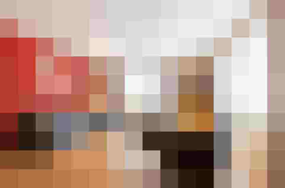 Modernes Apartment mit gemütlichem Wohnbereich, Esstisch und großem Fenster im Gasteinertal